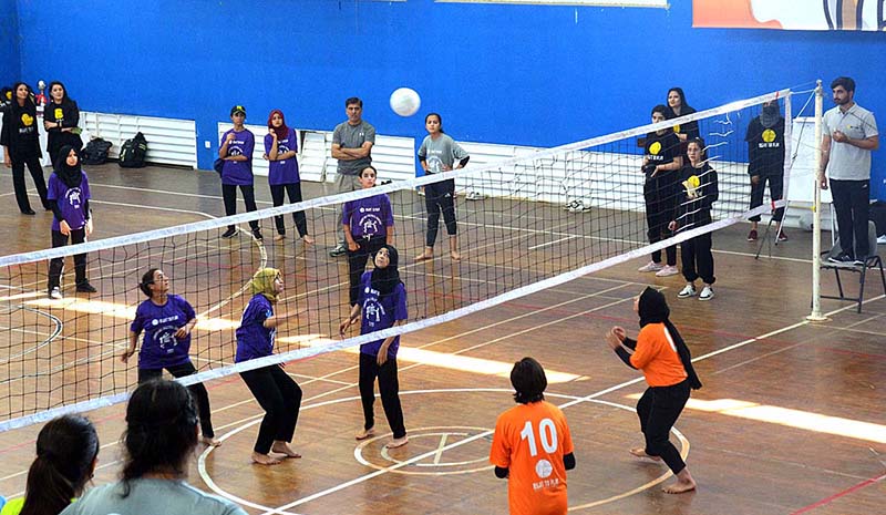 A view of volleyball match during Community Girls Volleyball Tournament 2023 at Pakistan Sports Complex