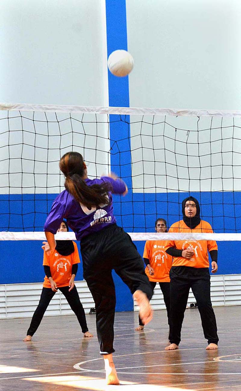 A view of volleyball match during Community Girls Volleyball Tournament 2023 at Pakistan Sports Complex