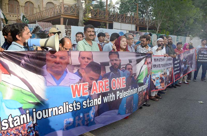 Journalists participating in a demonstration rally at Karachi Press Club to express solidarity with Palestinian journalists and their families, who are facing Israeli brutality