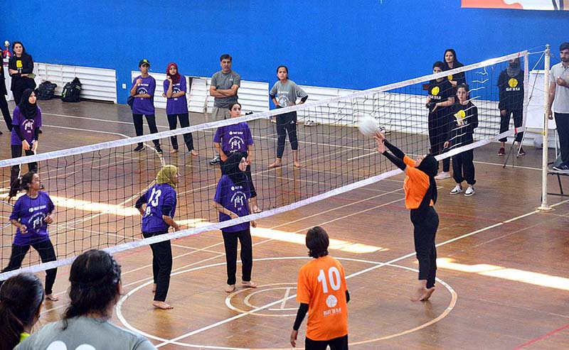 A view of volleyball match during Community Girls Volleyball Tournament 2023 at Pakistan Sports Complex