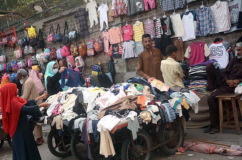 Vendor selling and displaying used toys to attract the customers
