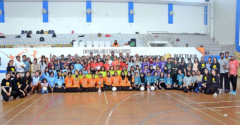 A view of volleyball match during Community Girls Volleyball Tournament 2023 at Pakistan Sports Complex