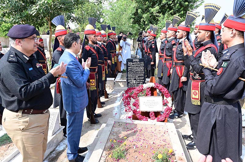 Caretaker Prime Minister Anwaar-ul-Haq Kakar offers fateha and lays floral wreath at the grave of former commandant of FC, Shaheed Sifwat Ghayur