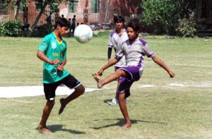 A view of volleyball match played between SD High School and Yazman teams during Inter-District Government Schools Sports Tournament at SD High School Ground.