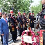 Caretaker Prime Minister Anwaar-ul-Haq Kakar offers Fateha and lays floral wreath at the grave of former commandant of FC, Shaheed Sifwat Ghayur