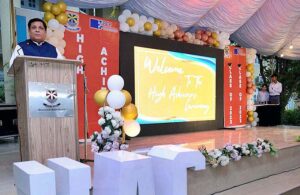 Students performing in tableau on stage during High Achievers ceremony of Beaconhouse FC Campus