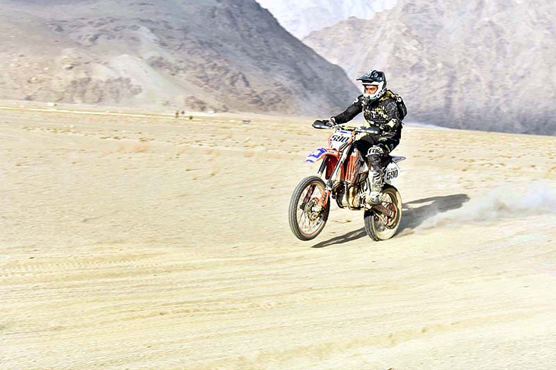 A Bike Racer participant approaching towards its target during the "Sarfaranga Cold Desert Rally 5th Edition 2023 in Final round at world highest desert Sarfaranga