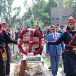 Caretaker Prime Minister Anwaar-ul-Haq Kakar offers fateha and lays floral wreath at the grave of former commandant of FC, Shaheed Sifwat Ghayur