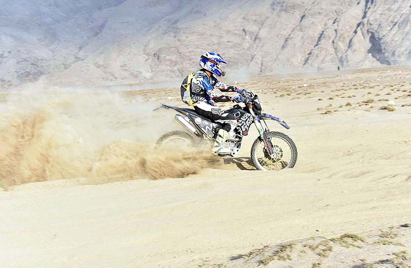 A Bike Racer participant approaching towards its target during the "Sarfaranga Cold Desert Rally 5th Edition 2023 in Final round at world highest desert Sarfaranga