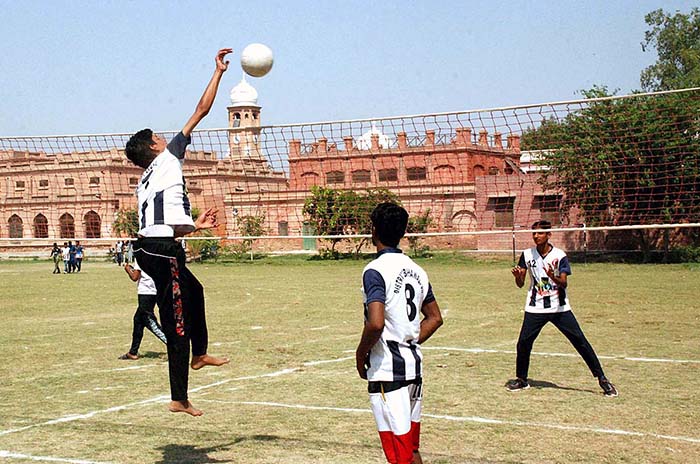 A view of volleyball match played between SD High School and Yazman teams during Inter-District Government Schools Sports Tournament at SD High School Ground.