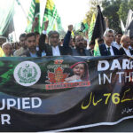 Caretaker Federal Minister for Information & Broadcasting, Murtaza Solangi leading a walk in connection with Kashmir Black Day at Constitution Avenue