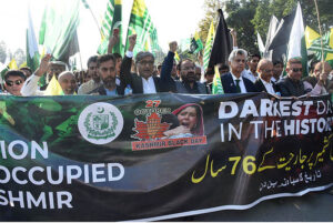 Caretaker Federal Minister for Information & Broadcasting, Murtaza Solangi leading a walk in connection with Kashmir Black Day at Constitution Avenue
