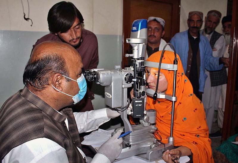 Eye specialist busy examine the patients at Helpers Hospital.