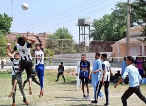 A view of volleyball match played between SD High School and Yazman teams during Inter-District Government Schools Sports Tournament at SD High School Ground.