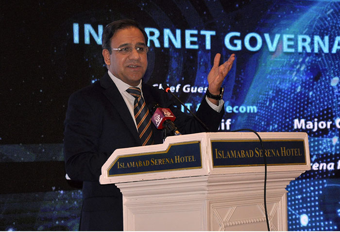 Caretaker Federal Minister for Information Technology and Telecommunication, Dr. Umar Saif addressing during the seminar on "Internet Governance in Pakistan"