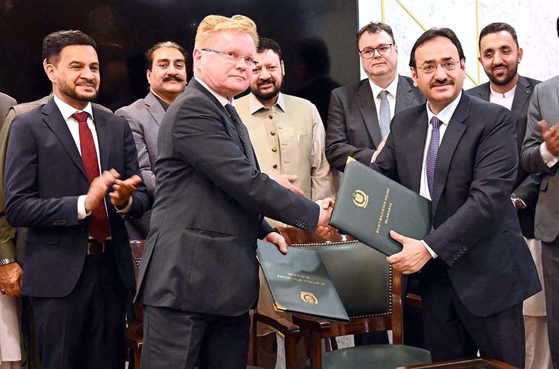 Provincial Secretary Power Gilgit-Baltistan and Chairman of Nor Hydro are signing the memorandum of understanding for the solar energy project started with the cooperation of Norway, Chief Minister Gilgit-Baltistan Haji Gulbar Khan and ambassador of Norway is also present
