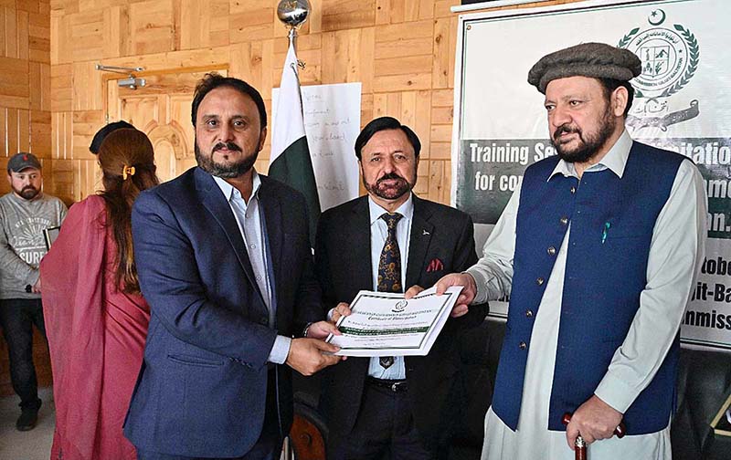 Chief Minister Gilgit-Baltistan Haji Gulbar Khan giving away certificate among the participant of workshop for the local Bodies Election.