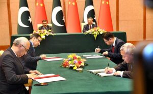 Caretaker Prime Minister Anwaar-ul-Haq Kakar and Chinese Premier Li Qiang witnessing the signing of MoUs between China and Pakistan to enhance cooperation in diverse fields.