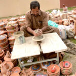 Worker are buying and selling at various stalls at the cultural fair in a festival at Jilani Park.