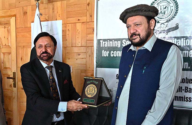 Chief Minister Gilgit-Baltistan Haji Gulbar Khan giving away certificate among the participant of workshop for the local Bodies Election.