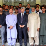 group photo of Caretaker Federal Minister for Information and Broadcasting Murtaza Solangi with Radio Pakistan Staff