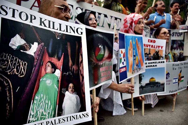 Activists of civil society holding play cards during a protest ...