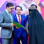 The Caretaker Prime Minister Anwaar-ul-Haq Kakar distributes cheques among the families of martyred polio workers and polio workers who got injured in the line of duty