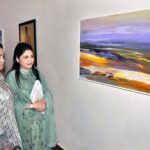 Visitors keenly viewing art work displayed during an exhibition PNCA & Nomad gallery present Safar-Journey of the Mavericks three person curetted by Nageen Hyat at PNCA