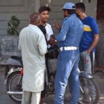 Traffic police Warden crack down on helmetless motorcyclists at Mall Road