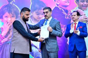 The Caretaker Prime Minister Anwaar-ul-Haq Kakar distributes cheques among the families of martyred polio workers and polio workers who got injured in the line of duty