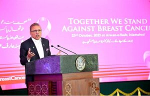 President Dr. Arif Alvi addressing a Breast Cancer Awareness program, at Aiwan-e-Sadr