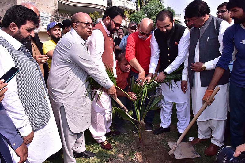 Social Leader Muhammad Khalid Wasim Advocate, International Biker Mukram Khan Tareen planting trees under Green Pakistan at Modal Town Ugokey organized by Sialkot Tourism and Cultural Forum