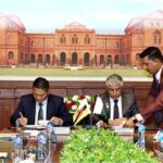 Secretary Defence, Lt Gen (Retd) Hamood uz Zaman Khan and Brunei Permanent Secretary Defence, Brig Gen (Retd) Dato Seri Pahlawan Haji Alirupendi Bin Haji Perudin signing MoM, in Ministry of Defence