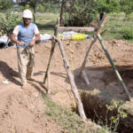 Laborers are excavating the ground to install new RCC pipe lines at the F-6 Sector.
