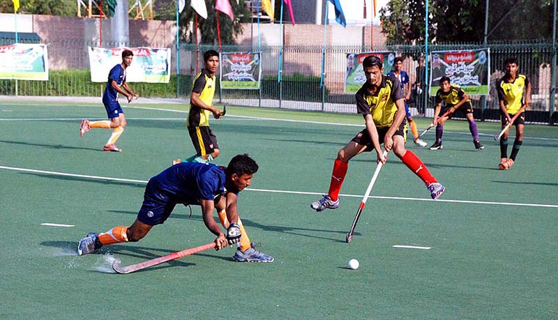 Khanewal and Bahawalngar players in action during final hockey match at Education Department South Punjab Inter District Sports Hockey Tournament