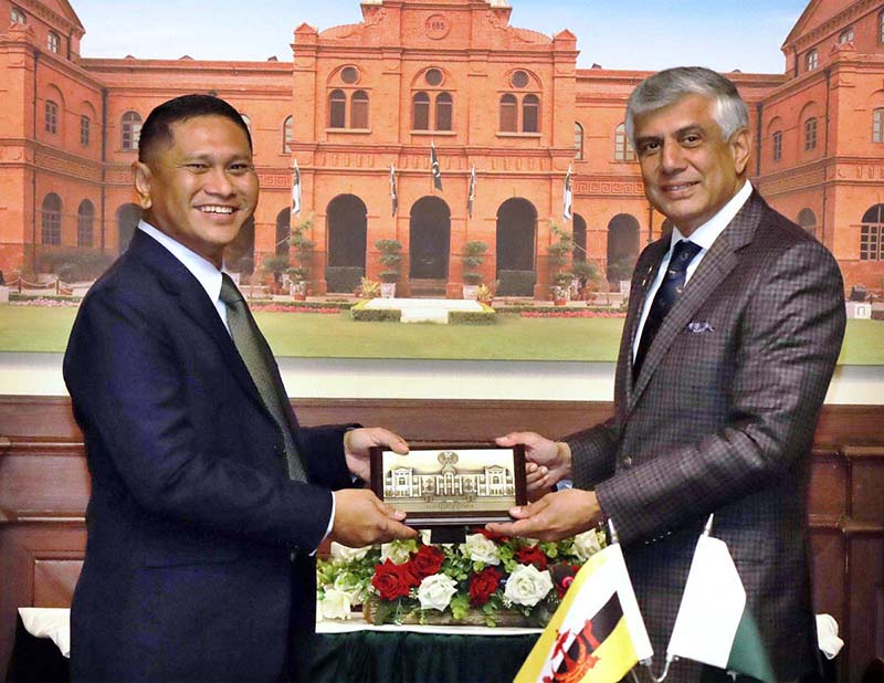 Secretary Defence, Lt Gen (Retd) Hamood uz Zaman Khan and Brunei Permanent Secretary Defence, Brig Gen (Retd) Dato Seri Pahlawan Haji Alirupendi Bin Haji Perudin signing MoM, in Ministry of Defence