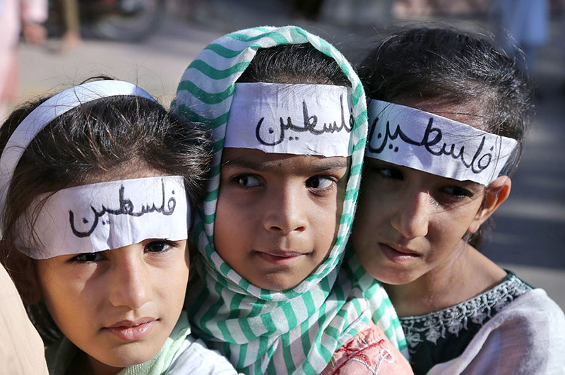 Children participating in a rally outside press club while thousands of people protested across the country after Friday prayers against Israel’s siege and fierce bombing on the Gaza Strip in retaliation to Hamas attacks