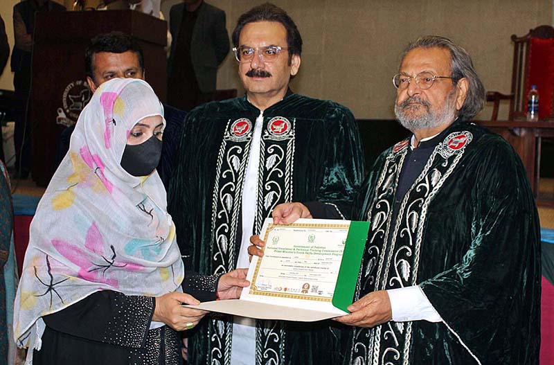 Caretaker Federal Minister for Education and Professional Training Madad Ali Sindhi distributing certificates in a graduation ceremony under PM’s Youth Skills Development Program at University of Balochistan