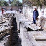 Labourer engaged in working the expansion of road project at Kalvin Road