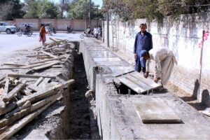 Labourer engaged in working the expansion of road project at Kalvin Road