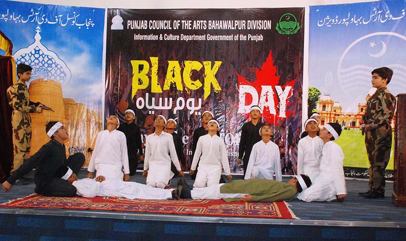 Students are performing tableau on the occasion of Kashmir Black Day at Arts Council