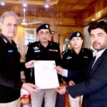 IGP Gilgit-Baltistan Afzal Mehmood Butt giving away certificate to Tariq Ali and Hassan Abbas after completing the training of computer forensic and latent fingerprint from the Punjab Forensic Science Agency (PFSA)