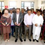 President Arts Council of Karachi Ahmed Shah cutting the ribbon to inaugurate painting and arts work exhibition at Art and Design University of Sindh Jamshoro