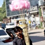 A street vendor selling out Candy in the downtown