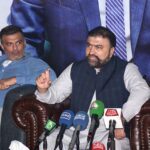 Caretaker Federal Interior Minister Sarfraz Bugti is talking to media persons after inauguration of electric motorbike unit at King Motorcycles near Chak No.209 Jaranwala Road