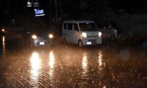 A view of the first winter rain during the nighttime