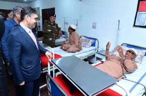 Caretaker Prime Minister Anwaar-ul-Haq Kakar visits patients who received free eye surgery from the government, in Mayo Hospital