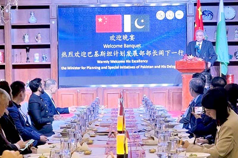 Caretaker Minister for Planning, Development & Special Initiatives, Muhammad Sami Saeed, delivering a speech at a gathering of Chinese technology enterprises