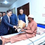 Caretaker Prime Minister Anwaar-ul-Haq Kakar visits patients who received free eye surgery from the government, in Mayo Hospital