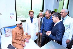 Caretaker Prime Minister Anwaar-ul-Haq Kakar visits patients who received free eye surgery from the government, in Mayo Hospital